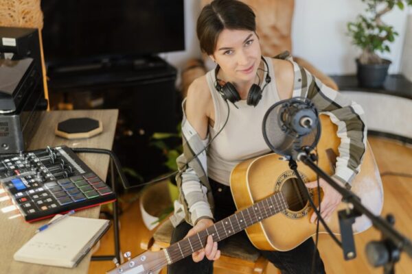 creative-woman-practicing-song-home