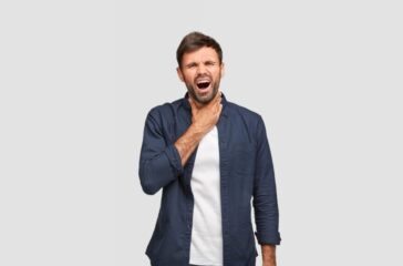 portrait-of-displeased-guy-feels-pain-has-sick-throat-cant-speak-loudly-has-asthma-assault-01