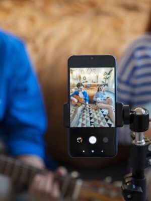 teenage-boy-girl-recording-music-their-home-studio-with-guitar
